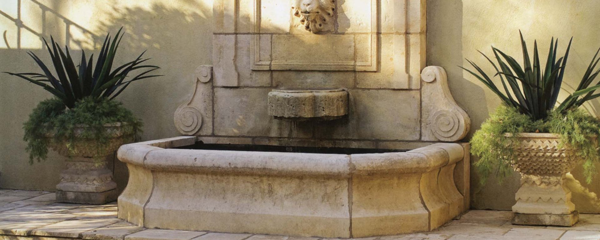 Tuscan antique old rustic reclaimed old world natural stone hand carved limestone exterior outdoor water wall fountain garden design ideas landscape